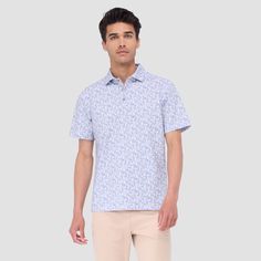 The Victor abstract print OoohCotton short-sleeved polo shirt featuring a three-button placket, mother-of-pearl buttons, and a self-fabric collar is the ideal choice for looking and feeling your best, whether you are enjoying a casual day or performing on the golf course. OoohCotton is a performance, double-mercerized, wrinkle-resistant, breathable, and easy-care cotton blend with 8-way stretch, quick-dry, and thermal comfort properties. Blue Johnny Collar Polo Shirt For Summer, Summer Collared Polo Shirt With Button Closure, Short Sleeve Polo Shirt For Summer Golf, Spring Golf Polo Shirt With Short Sleeves, Summer Short Sleeve Polo Shirt For Golf, Spring Short Sleeve Golf Polo Shirt, Summer Polo Shirt With Short Sleeves, Summer Short Sleeve Polo Shirt With Placket, Summer Short Sleeve Polo Shirt