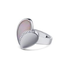 A sweet heart design by Movado featuring a mother of pearl and round diamonds. The mother of pearl is set in half of the heart as diamonds line the edge and center of the heart. Details: SIZE: 18 White gold 1/2 Pink Mother of Pearl Design: Heart Shape 15 Diamonds Cut: Round Color: G Clarity: VS-1 Total Carat Weight: 0.05cts The Pink Mother of Pearl and Diamond Movado Heart Ring is available at Burdeen's Jewelry. We have many unique offerings of estate jewelry listed on our Etsy store. Consider b Elegant Double Heart Rings For Formal Occasions, Luxury White Heart Ring With Diamond Accents, Elegant Heart-shaped Ring With Polished Finish, Luxury White Heart Ring, Elegant Polished Heart Cut Ring, Elegant White Gold Heart Ring With Polished Finish, Elegant Oval White Gold Heart Ring, Jewelry 2022, Pearl Design