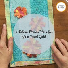 a person holding a piece of paper with flowers on it and the words 5 fabric flower ideas for your next quilt