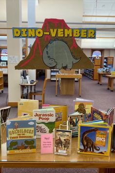 there are many books on the table in the library and some children's books