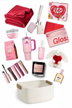 the contents of a pink valentine's day gift bag laid out on a white surface