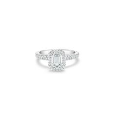 Diamond White Emerald Cut Halo Ring With Center Stone, Diamond White Halo Ring With Emerald Cut Center Stone, Emerald Cut Diamond White Wedding Ring With Halo Setting, Classic Emerald Cut Diamond Halo Ring, Square Cut Emerald Ring With Diamond For Promise, Classic Emerald Cut Halo Wedding Rings, Emerald Cut Diamond Halo Ring With Center Stone, White Emerald Cut Platinum Emerald Ring, Classic Emerald-cut Diamond Ring With Halo Setting