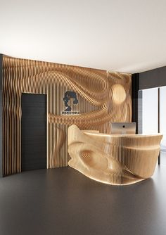 an artisticly designed wooden wall in a room