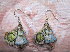 The Alice in Wonderland earrings are made from recycled teabag artwork and feature the iconic and beautiful artwork of John Tenniel's classic illustrations. Made from completely recycled materials. John Tenniel, Beautiful Artwork, Recycled Materials, Alice In Wonderland, Jewelry Earrings Dangle, Etsy Earrings, Dangle Drop Earrings, Dangle Earrings, Jewelry Earrings