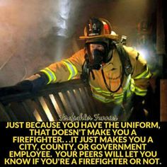 a firefighter standing on top of a wooden bench