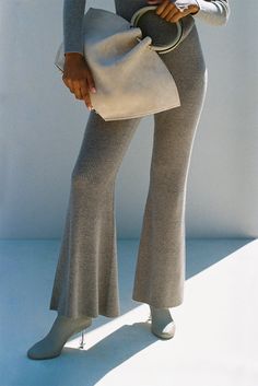 A ribbed knit flare pant with an elastic waistband. — High waisted — Pull on style — Ribbed knit fabric — Wear with the Belle Knit Turtleneck Ribbed Knit Fabric, Flare Pant, Swimming Bag, Knit Turtleneck, Candle Collection, Kids Sandals, Knit Pants, Cozy Fall, Leather Jewelry