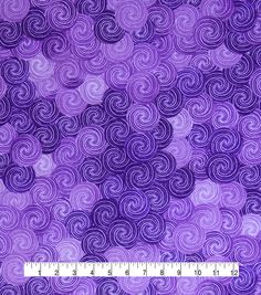 a purple background with swirls on it and a ruler in front of the image