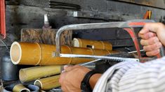 a man is working on some kind of pipe