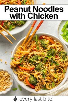 two bowls filled with peanut noodles and broccoli on top of a white table