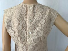 "Gorgeous antique lace blouse with button down back Tagged size 32, see measurements below Measurements are approximate and taken laying flat, double where appropriate 17\" bust armpit to armpit 17\" hip taken along hem 16\" waist Gorgeous floral lace in cream/beige, darting at bust and back accent the bodies shape. Top is lined in matching tone sheer fabric Scalloped edges at arms and hem, also beautiful cutouts highlight the neck Excellent vintage condition no issues found" Vintage Lace Blouses, Vintage High Waisted Shorts, Gloves Vintage, Lace Sleeveless Top, Military Style Jackets, Peasant Blouse, Antique Lace, Ruffle Top, Lace Blouse