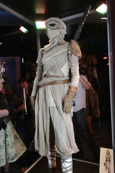 a star wars costume on display in a store window