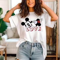 Cute Disney Kiss Shirt Disney Valentine Shirt Mickey Minnie Valentine Shirt   Your everyday style essential. Made with soft, breathable fabrics for comfort all day long. Choose from a variety of designs and colors to showcase your personal style. Perfect for casual outings or layering with other pieces. Versatile, timeless, and a must-have in any wardrobe.Cute Disney Kiss Shirt Disney Valentine Shirt Mickey Minnie Valentine Shirt  – Our Custom T-shirts are what you are looking for. Mad Disney Cotton Shirt With Cartoon Print, Disney Summer Shirt With Letter Print, Cute Minnie Mouse Crew Neck Shirt, Cute Minnie Mouse Shirt With Crew Neck, Casual Minnie Mouse Crew Neck Shirt, Casual Crew Neck Minnie Mouse Shirt, Casual Short Sleeve Shirt With Minnie Mouse, Casual Minnie Mouse Short Sleeve Shirt, Mickey Mouse Shirt For Disney Fan Events In Summer