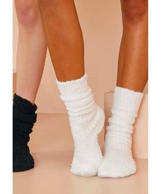 Knee high ribbed socks. Comes in Winter White and Black. Final Sale, No Return or Exchange. Imported 100% Polyester Machine wash cold