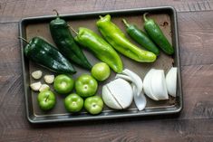 green peppers, onions, and garlic on a tray