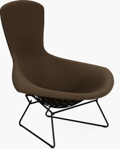 a brown chair sitting on top of a metal frame with a black base and foot rest