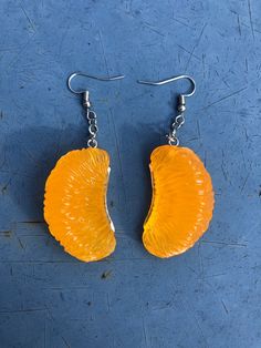 Earrings made from 100% resin clementine slices! 🍊 They're So realistic, and a perfect pop of color 🧡 Orange Resin Jewelry For Party, Fun Orange Earrings As A Gift, Fun Orange Earrings For Gift, Fun Orange Earrings For Gifts, Fun Orange Earrings For A Gift, Fun Orange Drop Earrings, Labour Day, Color Pop, Jewelry Earrings Dangle