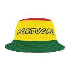 This Portugal bucket hat is a patriotic national team fan hat for any sport with the Portuguese flag colors of intense green, red and yellow with the word "Portugal" in yellow and blue on a polyester bucket hat. Makes a perfect hat for a national holiday, sporting event, Portuguese party or Halloween party costume, Halloween costume, team Portugal hat, football fan hat, soccer fan hat, soccer fan apparel, men's hat or women's hat, or just for fun! -Material: 100% polyester -Available in 2 sizes Green Sports Bucket Hat, Multicolor Casual Sports Hats, Green Bucket Hat For Sports, Sporty Multicolor Baseball Cap, Casual Multicolor Snapback Hat For Sports, Multicolor Snapback Hats For Sports Events, Yellow Casual Baseball Cap For Sports Events, Casual Yellow Baseball Cap For Sports Events, Yellow Cap For Sports Events