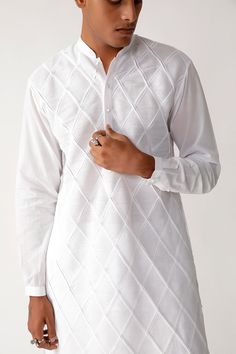 Cotton Kurta With Geometric Embroidery And Long Sleeves, Traditional Straight Kurta With Pintucks, Traditional Kurta With Pintucks For Eid, Traditional Long Sleeve Kurta With Pintucks, Eid Straight Kurta With Pintucks, Elegant Long Sleeve Kurta With Geometric Embroidery, Designer Cotton Kurta For Formal Occasions, Eid Pintucks Straight Kurta, Traditional White Kurta With Buttons