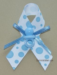 a blue and white ribbon with polka dots on it