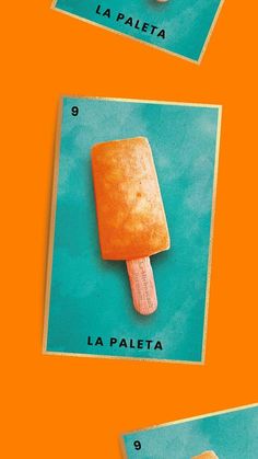 an orange and green poster with two popsicles on it, one has a bite taken out of it