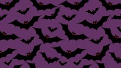 a lot of bats with glowing eyes on them