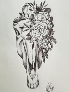 a drawing of a cow skull with flowers on it