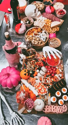 a table filled with lots of different types of food