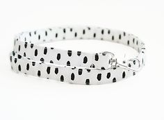 This fun white lanyard with large black modern dots offers a fun and functional way to wear your ID badge or keep track of your keys.  Made from 4 layers of high quality cotton fabric, this lanyard combines flexibility with durability. It is constructed to be comfortable enough to wear around your neck all day long. This lanyard measures approximately 1/2 inch wide (approx. 13 mm) and is available in three lengths: 15.5 inch drop 17.5 inch drop 19.5 inch drop Lanyard lengths are measured from th Fabric Lanyard, Lip Balm Holder, Teacher Appreciation Gift, Id Badge Holders, Clear Vinyl, Id Badge, Black Polka Dot, Badge Holders Lanyard, Badge Holders