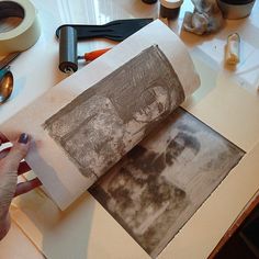 a person is working on an old photo