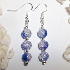 This Funky Beaded Earring Set Is Brand New & Handmade By Me - Wvluckygirl. Done With Ombre Style Crackled Glass Beads That Fade From Blue To Clear. Beads Have Pits/Dents Which Is Just How They Are Made And Not Considered To Be A Flaw. They Have Antiqued Silver Toned Costume Jewelry Beads. The Pair Dangle & Drop From 925 Sterling Silver French Fish Hook Ear Wires For Pierced Ears. 2 1/4 Inches Tall & Just Over 1/4 Inch Wide. Each Single Earring Weighs 2.8 Grams. Dress To Impress Wearing These! Fa Blue Glass Beaded Earrings With Ear Wire, Handmade Blue Dangle Plug Earrings, Mauve Earrings, Handmade Blue Glass Earrings, Blue Hypoallergenic Glass Earrings, Blue Glass Earrings With Dangling Beads, Blue Pearl Earrings, Celtic Knot Jewelry, Animal Print Earrings