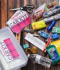 the contents of a craft kit laid out on a wooden table with scissors and other items