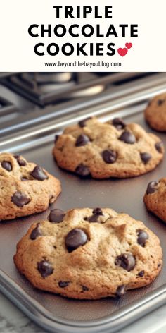 chocolate chip cookies on a baking sheet with text overlay that reads triple chocolate cookie