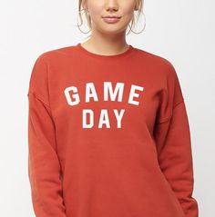 Game Day Crewneck sweatshirt is a great gift for your boyfriend, best friend or anyone that loves football, baseball or basketball! This Ring spun unisex Sweatshirt is a cozy addition to your holidays! SIZING:For best fit, please use our measurement chart. Measure your favorite sweatshirt from arm pit to arm pit and top to bottom and compare with our chart. We are as accurate as possible but industry standards for manufacturing may have variation up to one inch in length and width. Fits larger t Game Day Crew Neck Sweatshirt For Sports Season, Game Day Crew Neck Sweatshirt, Team-colored Cotton Sweatshirt For Game Day, Crew Neck T-shirt For Game Day In Fall, Crew Neck Sweatshirt For Game Day, Team Spirit Sweatshirt For Game Day With Letter Print, Varsity Sweatshirt With Lettering For Game Day, Football Season Crew Neck Top With Lettering, Casual Sweatshirt For Baseball Season