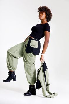 "Let them catch your vibe wearing this edgy pant set with matching jacket. This combo is crafted with cotton, mixed with denim, and designed with three pockets on the jacket, and three pockets on the pants, Cargo style! The jackets design is color blocked for that edginess it brings and the pants has a unique outer pocket on the left front and a half belt closure. Pair up this outfit with a cute bandeau top, or bodysuit and combat boots, Make all your friends wish they had this set too. All of o Baggy Cotton Outerwear With Pockets, Cotton Parachute Pants With Hip Pockets For Outdoor, Winter Cotton Cargo Pants With Hip Pockets, Winter Cotton Cargo Pants With Pockets, Winter Cotton Cargo Pants With Multiple Pockets, Trendy Winter Cargo Pants In Cotton, Military Style Cotton Parachute Pants With Multiple Pockets, Fall Techwear Cotton Cargo Pants, Baggy Cotton Urban Outerwear