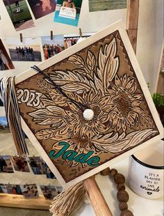 a decorated graduation cap on top of a table