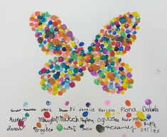 a butterfly made out of colorful confetti on a white background with words written below it