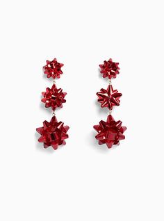 Put a bow on top! Shiny holiday-inspired bows cascade down these earrings for a seasonal statement you can wear to that holiday office party. Post backs. Base metal. Imported. The best plus size women's red holiday bow statement earrings in red. Torrid is your destination for cozy fall and winter clothes to keep you warm and comfortable. Christmas Party Jewelry, Sparkle Hoop Earrings, Office Holiday Party, Dragon Earrings, Holiday Bows, Purple Rhinestone, Holiday Earring, Red Earrings, Office Party