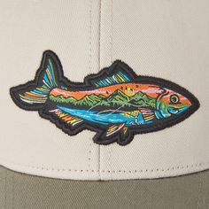 Hit the road or the nearest hike in our Trucker, the perfect companion for outdoor adventures near or far. 100% Cotton 8.26 oz. Structured front with firm mesh back Snapback with Life is Good® label on the back Six panel structured low-mid crown with six rows of stitching on the brim. Woven patch Imported | Life is Good Fish Mountain Scene Hard Mesh Back Cap in Bone Outdoor Six-panel Trucker Hat With Logo Patch, Outdoor Six-panel Snapback Hat With Logo Patch, Six-panel Baseball Cap With Logo Patch For Outdoors, Outdoor Logo Patch Six-panel Snapback Hat, Logo Patch Six-panel Baseball Cap For Outdoor, Trucker Hat With Logo Patch For Outdoor Activities, Curved Bill Baseball Cap With Logo For Outdoor Activities, Outdoor Trucker Hat With Logo Patch, Curved Bill Baseball Cap With Logo Patch For Outdoor