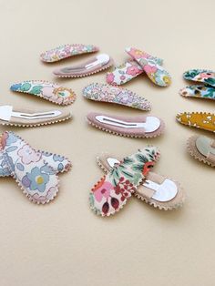 A set of two fabric-covered snap clips by Australian brand, Josie Joan's.The perfect addition to any outfit, these wonderfully whimsical hair clips feature a petite scalloped edge.Josie Joan's beautiful & unique hair accessories encompass a range of heritage prints from Liberty of London and Rifle Paper Co.Dimensions: each clip measures 5.5cm in length (just over 2")Pattern placement may vary. Please avoid getting your snap clips wet. Creative Scrunchie Ideas, Fabric Hair Accessories, Facial Esthetics, Fabric Clips, Whimsical Hair, Unique Hair Accessories, Hair Clips Diy, Felt Hair Clips, Kid Craft