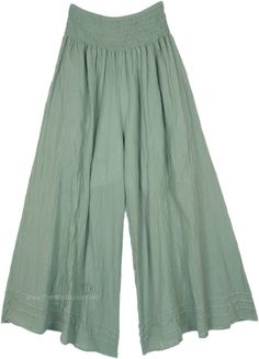 These cottage-core wide-leg pants are crafted from soft, breathable cotton, offering a comfortable and relaxed fit - and they have pockets! Designed with a high, elastic smocked shirred waistband, they are one size fits most.  The light sage green color adds a serene and natural touch, making these pants versatile and easy to pair with various tops. #tlb #SplitSkirtsPants #Misses #Fall #bohemianfashion #WideLegPants #HippiePants Cotton Wide Leg Full-length Pants In Solid Color, Cotton Wide Leg Pants In Solid Color, Wide Leg Cotton Pants In Solid Color, Solid Color Cotton Wide Leg Pants, Cotton Wide Leg Pull-on Pants, Solid Cotton Wide Leg Pull-on Pants, Non-stretch Cotton Wide Leg Pants, Comfortable Wide Leg Cotton Pants, Comfortable Cotton Wide Leg Pants With Elastic Waistband