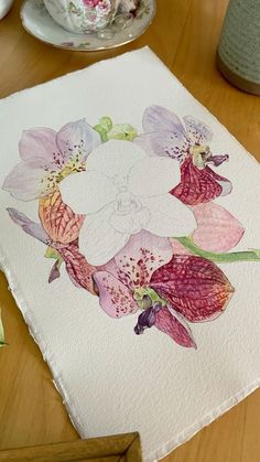 a watercolor painting of pink and white orchids on a table with teacups in the background