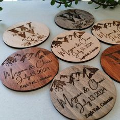 engraved wooden coasters with names and dates on them