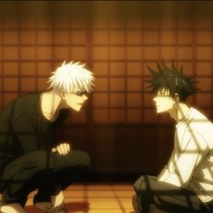 two anime characters sitting on the ground