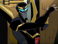 an animated image of a man in black and gold armor with his arms outstretched out