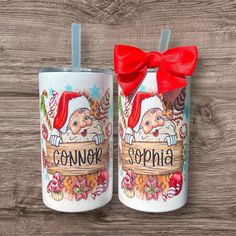 two coffee mugs decorated with santa claus and the words gonzopia on them