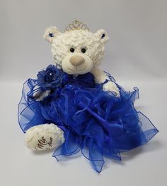 PRICES MAY VARY. 20" Quinceanera Teddy Bear with dress Can be given as a gift or used as a centerpiece 20 inches in height. Rhinestone tiara and an embroidered " Mis 15 Anos" For Collection and Decoration Purpose. For Age 14+. Due to different monitors/calibrations colors may vary slightly from the actual product. For those that are looking for something other than a doll... we now have the option of Quince Bears. These bears measure 20" long. Crème color, soft and cuddly, dressed in an elegant, Quinceanera Last Doll, Quince Bears, Quince Bear, Quinceanera Teddy Bear, Dress Centerpiece, Crème Color, Quince Pictures, Doll Teddy Bear, Quince Ideas