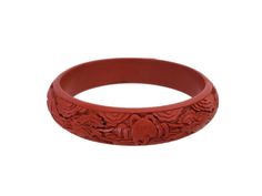 Antique Victorian Era Chinese DRAGON Red Lacquer Cinnabar Carved Wood Bangle Bracelet Condition:  Pre-owned, overall excellent!  Normal light wear commensurate with age. Measurements: Approximately 0.5 inches wide and 7.75 inches long Era 1890 to early 1900's Lovely antique Chinese export bangle bracelet, made in the late 19th century.  Finely carved wood with red cinnabar lacquer depicting a detailed figure of a long mythical dragon, flying in the clouds. FREE SHIPPING, US Only Thank you for looking and don't forget to check out my shop for additional fabulous finds~ Ceremonial Red Adjustable Bangle, Adjustable Red Ceremonial Bangle, Adjustable Red Bangle For Ceremonial Occasions, Adjustable Red Bangle For Ceremonial, Dragon Flying, Mythical Dragons, Wood Bracelet, Red Lacquer, Chinese Export