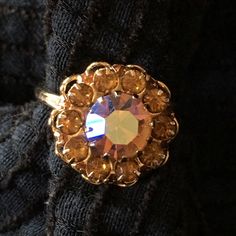 Vintage Sarah Coventry Golden Amber Rhinestones Flower Filigree Ring Adjustable This Collection Comes From The Estate Of A Sc Regional Manager. Nearly All Pieces Are Nos (New Old Stock) & Never Worn. This Is The Professional Collection Of This Individual. New Items Listed Regularly. Items Listed To The Best Of My Ability & Sold “As Is”. Thank You For Looking. Gold Crystal Ring With Rhinestones For Formal Occasions, Gold Crystal Ring With Rhinestones, Sarah Coventry Jewelry Vintage, Regional Manager, Glitter Ring, Filigree Ring Gold, Hematite Ring, Sarah Coventry Jewelry, Golden Amber