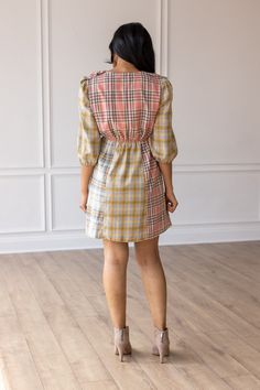 The Pink and Yellow Plaid Dress is an adorable fashion choice that radiates charm and playfulness. Featuring a delightful grid pattern of intersecting horizontal and vertical lines, this dress combines sweet pink and cheerful yellow hues for an irresistibly cute and lively look. Material: 100% Cotton Fit: True to Size Model: Wearing size Small Yellow Plaid Dress, Multi Dress, Yellow Plaid, Plaid Dress, Retro Prints, Body Measurements, Pink And Orange, Print Dress, Multi Color