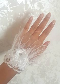 FAST SHIPPING.. ELISA DESIGN EXCLUSIVE WEDDING COLLECTION.. Designed with pearls and crystal beads on white tulle lace. This glove, which is elegant with its feathers, will make you feel special on your wedding night. As we said, you imagine, we can design.. Measurement; Wrist width : 7.5" Beaded Pearl Bridal Accessories For Wedding, Elegant Beaded Lace Bridal Accessories, Delicate White Bridal Accessories For Mother Of The Bride, Elegant Lace Bridal Accessories For Marriage, Elegant Lace Bridal Accessories For Wedding, Elegant Lace Bridal Accessories, Train Nursery, Wood Train, Train Decor